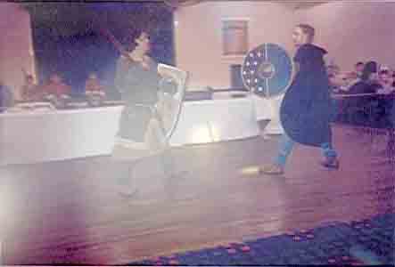 Picture of a demonstration sword fight. Picture of a demonstration sword fight.