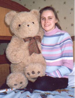 Picture of Maxine with teddy bear that's almost as large as she is Picture of Maxine with teddy bear that's almost as large as she is