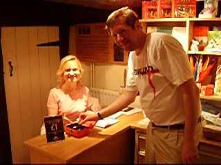 Alistair paying Wendy his entrance fee Alistair paying Wendy his entrance fee