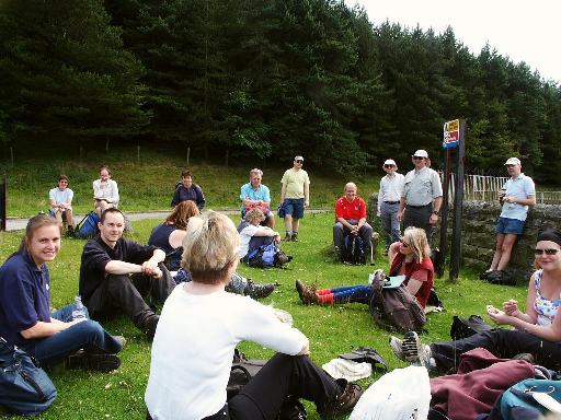 Picture of the group relaxing on a break from their walk