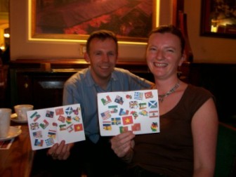 Picture of Sarah and Adrian Parkinson with their Globetrougher passports covered in stamps Picture of Sarah and Adrian Parkinson with their Globetrougher passports covered in stamps