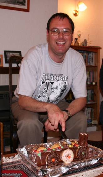 Picture of Richard Allen with his railway engine shaped cake. Picture of Richard Allen with his railway engine shaped cake.