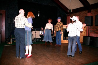 Picture of the group square dancing Picture of the group square dancing