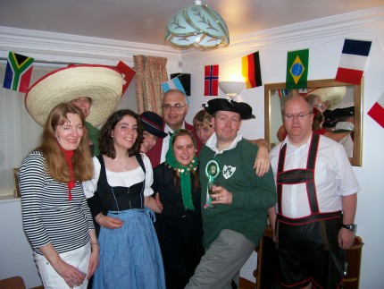 Picture of the group, dressed in a range national costumes. Picture of the group, dressed in a range national costumes.